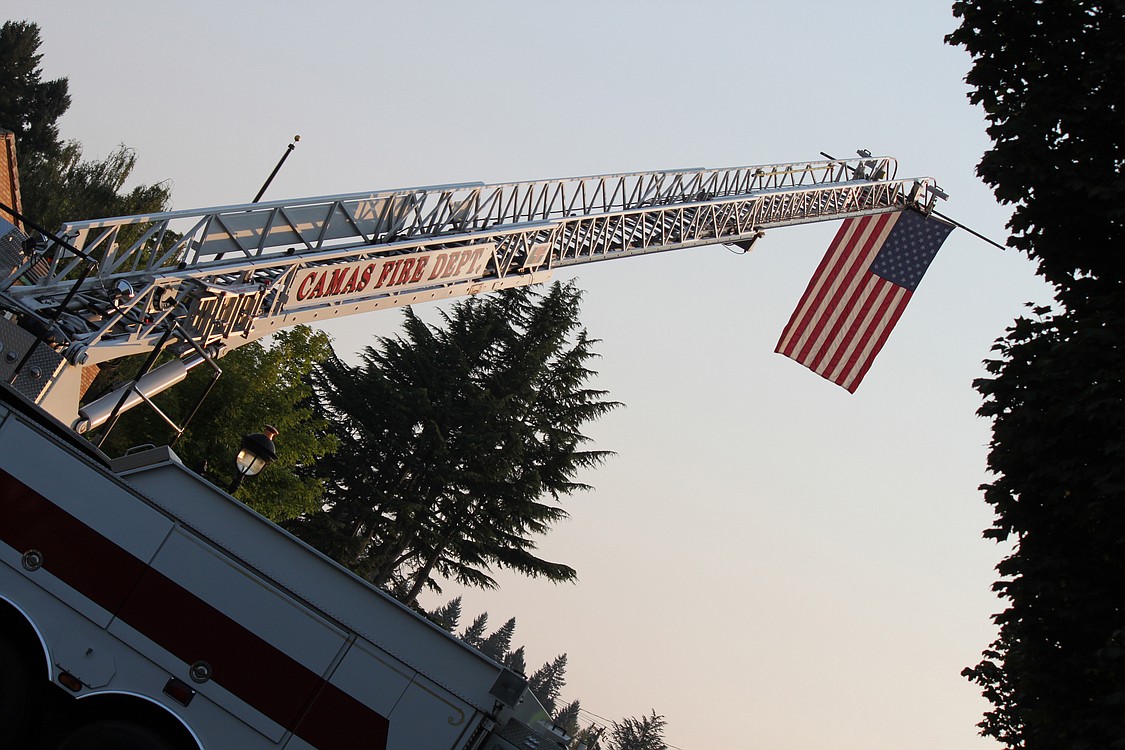Camas Fire Department engines blocked off Northeast Fourth Avenue, between Everett and Franklin streets during the remembrance event. During a speech, Camas Interim EMS Capt. Cliff Free recognized the 418 firefighters and police officers who died as a result of the terrorist attacks. That day they knew only of their duty, he said of the fallen heros. Their duty to place the suffering of others above that of their own. Nearly 3,000 people including military personnel and civilians men, women and children were also killed that day.