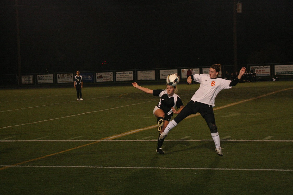 Washougal High School senior Amanda Acheson goes on the attack for the soccer ball Oct. 30, at Fishback Stadium.