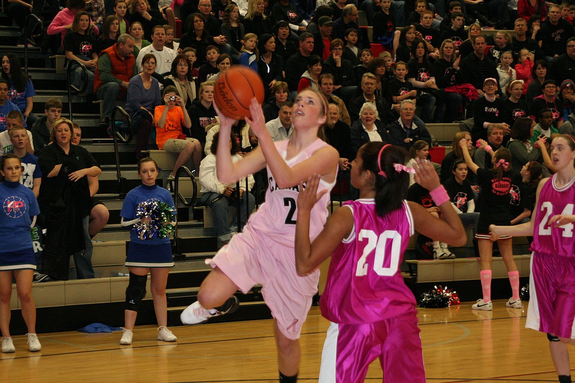 Sydney Allen drives in for two points.