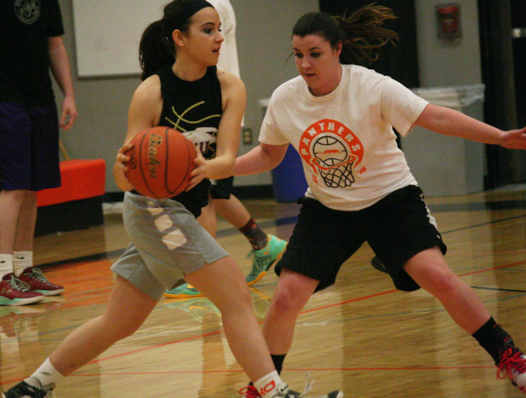 Panther alum Brenna Vargo (left) takes on WHS senior Alyssa Blankenship (right). Vargo just received a scholarship to play basketball at Robert Morris University, in Chicago. She has one more quarter to finish up at Pierce Community College, in Tacoma, before making her big move to the Windy City.