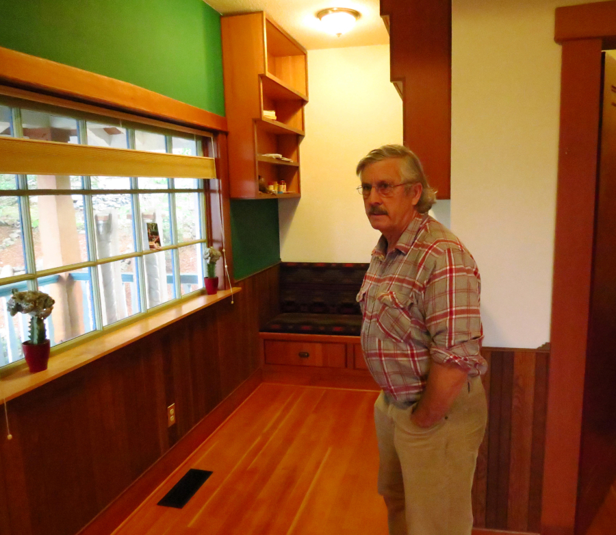 Brian Skinner's favorite place in his hand-crafted house is a nook near the doorway. The fabric on the bench was purchased from Pendleton Woolen Mills in Washougal.