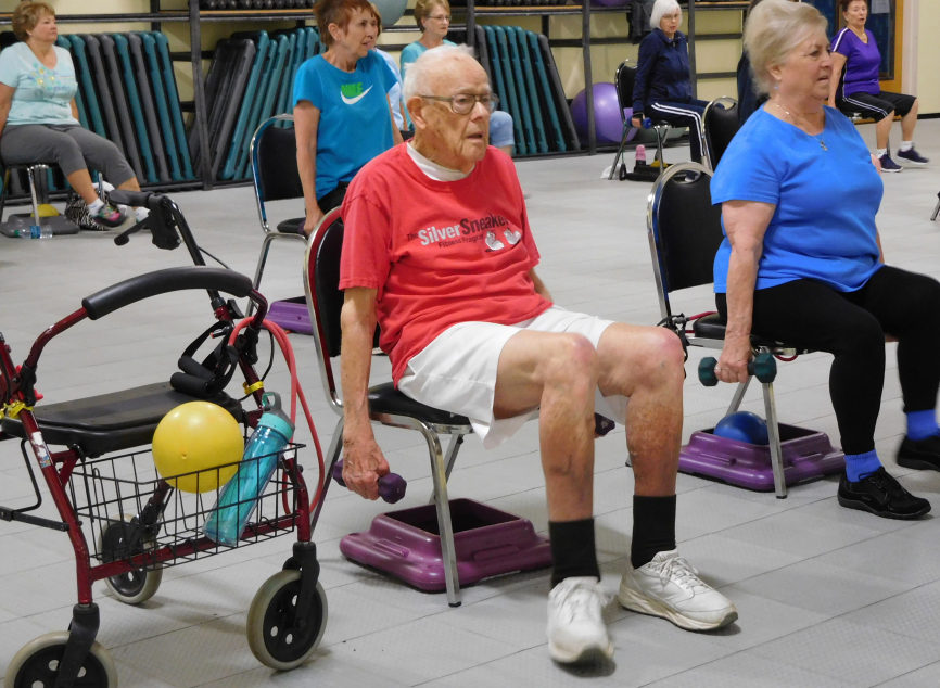 Buchholz's positive attitude and sense of humor make him a popular figure with other attendees at Lacamas Swim and Sport.