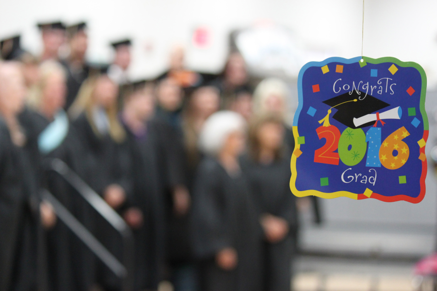 Excelsior High School students and staff gathered to take pictures and share last minute hugs and words of wisdom before the start of the graduation ceremony. 