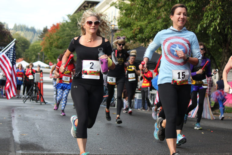 Presented by the Battle Ground-based non-profit Get Bold Events, the 15K Superhero Relay featured teams of three runners, dressed in hero and villain costumes. Each member ran a 5K leg that began at Pendleton Woolen Mills and continued along the Dike Trail and back. The event was held on Saturday, in conjunction with Oktoberfest held at Reflection Plaza in downtown Washougal.