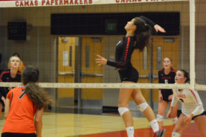 Keelie LeBlanc delivers one of her 17 kills for the Papermakers against Battle Ground Thursday, at Camas High School.