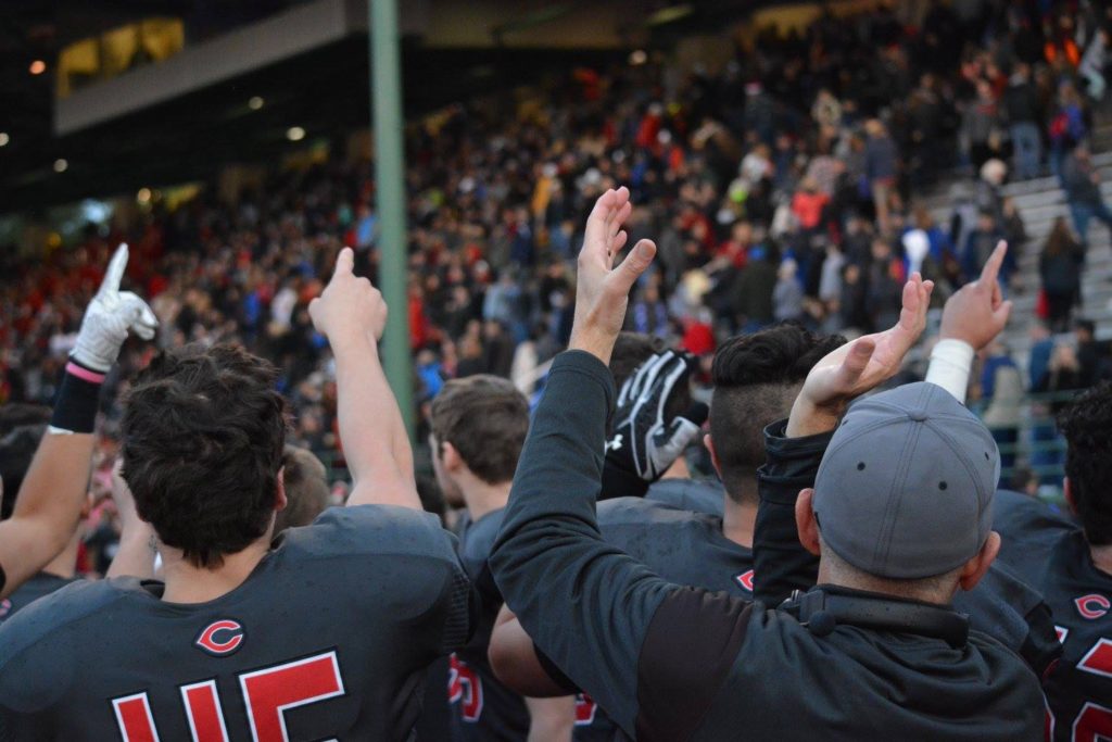 The Camas football players and coaches thank a sell out crowd for cheering the Papermakers on to victory.