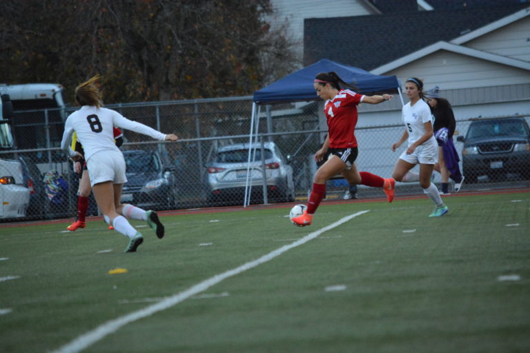 Maddie Kemp fires in the first goal for the Papermakers in the state championship game.