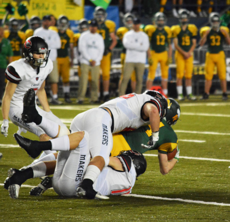 Two Papermakers sandwich tackle a Richland Bomber.