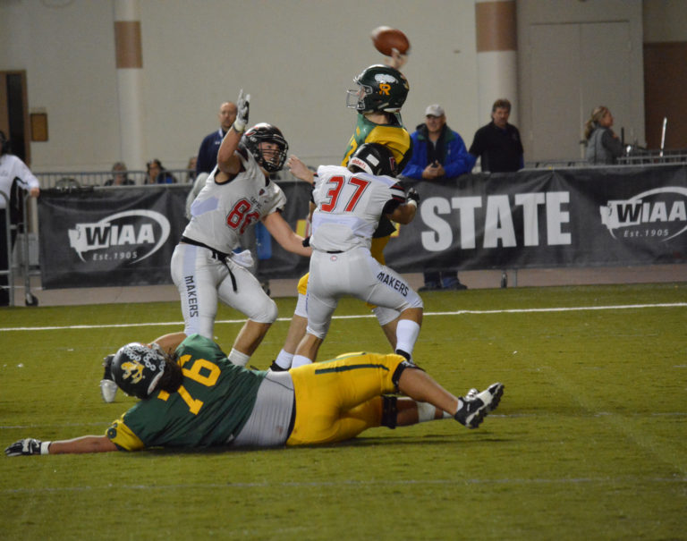 Will Schultz and Dylan Ingram force the Richland quarterback to throw the ball away so he doesn't get sacked in the end zone.