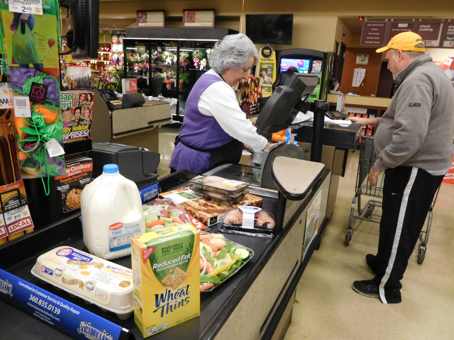Elena Ephlin, a checker at Safeway in Camas, recently wore purple in honor of Jean Zawistowski, a frequent customer who died at the age of 91, Dec. 21. Purple was Zawistowski's favorite color. 