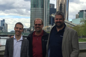 Dr. Alex Streit, president of ImmersaView Inc., Ron "Opie" Wiegand, president and chief executive officer of PLEXSYS Interface Products, Inc., and Dr. Andy Boud, president of ImmersaView Pty Ltd., recently met to finalize the merger of PLEXSYS and ImmersaView.  PLEXSYS, of Camas, provides Live Virtual Constructive synthetic communications training solutions, and ImmersaView develops visualization software. (Contributed)