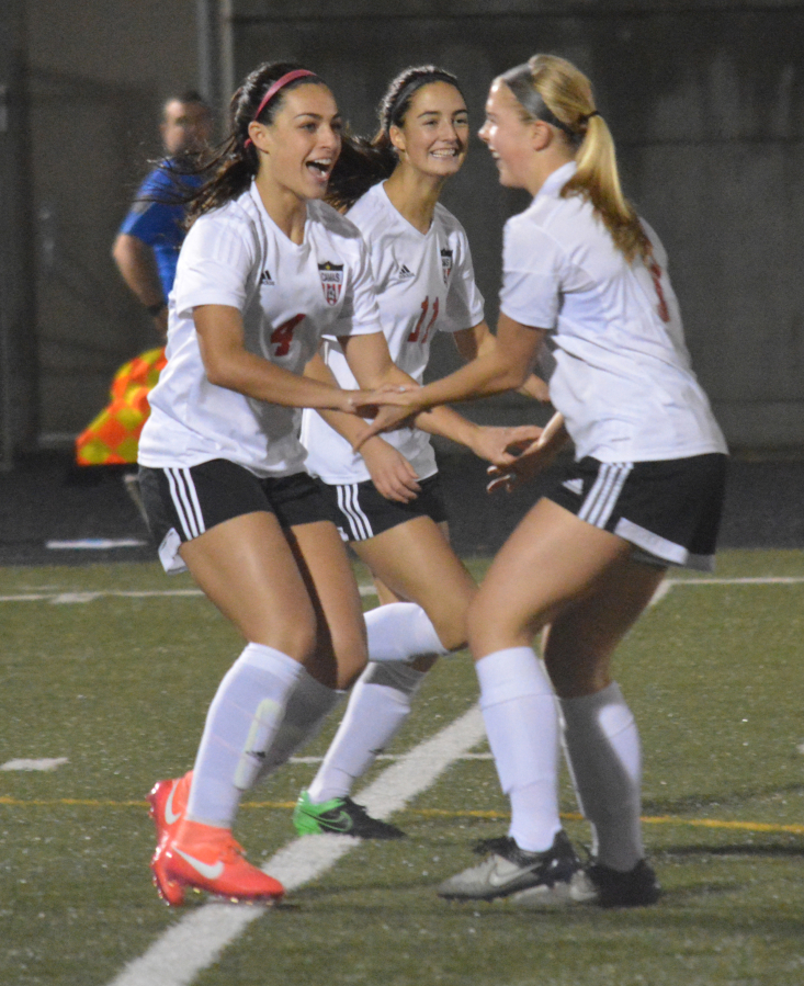 The Washington State Soccer Coaches Association named Maddie Kemp (left) the Class 4A MVP.