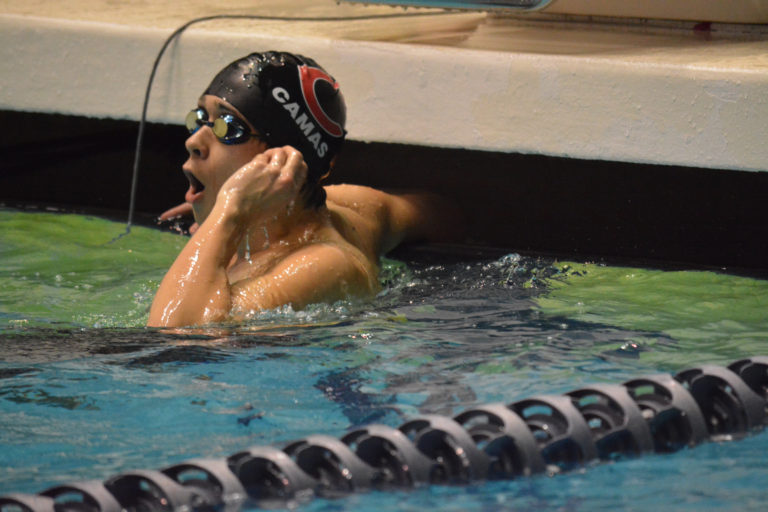 Tom Utas reacts to winning the 50 freestyle state championship for Camas.