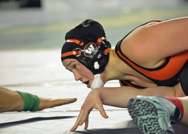 Morgan Ratcliff pins down seventh place for the Panthers in the state 145-pound girls wrestling bracket at the Tacoma Dome Saturday.