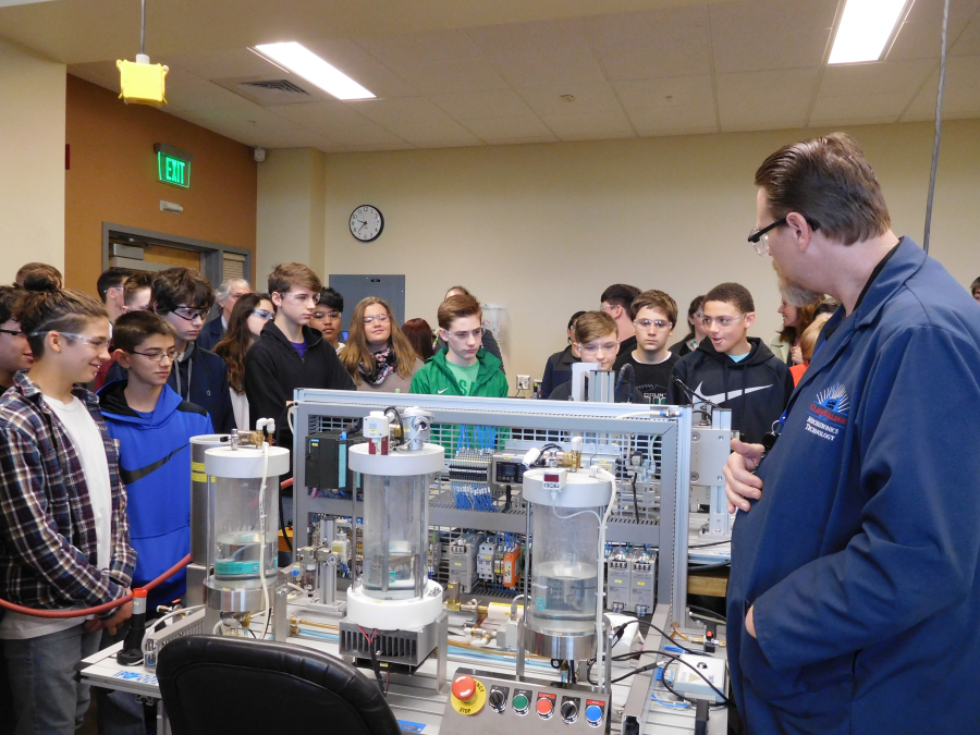 Professor Christopher Lewis explains how the various machines in the manufacturing and assembly automation lab works. Students who work on these machines can be presented with a number of simulated challenges they need to solve.