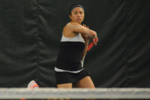 Hannah Gianan returns a serve during the fifth-place medal match at the bi-district tournament Saturday in Kent. The Camas High School senior defeated Union's McKenzie Schreiner 6-2, 6-2 to get back to state for the fourth year in a row.