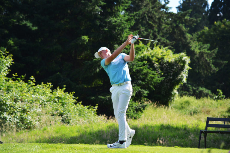 Spencer Tibbits watches his tee shot land on the 12th green at Royal Oaks.
