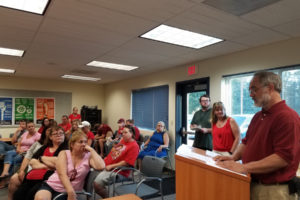 Frank Zahn, president of the Washougal Association of Educators (at podium) speaks to the School Board Tuesday. 