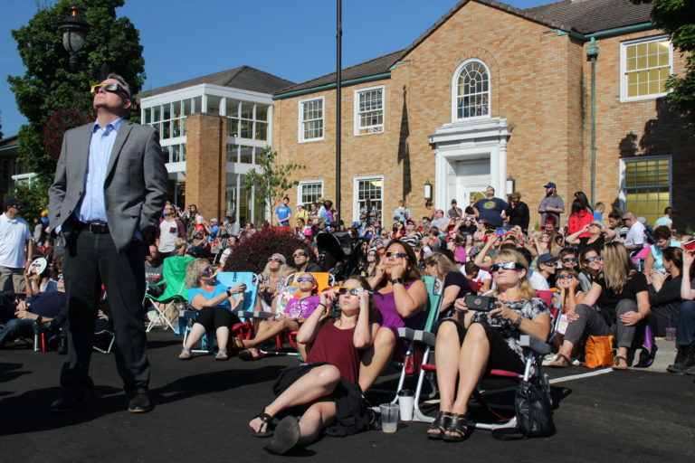 Crowds gathered in front of the Camas Library on Monday morning, Aug. 21, to view the historic solar eclipse. Photo by Kelly Moyer/Post-Record