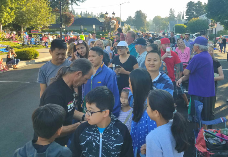 By 8:15 a.m., lines to snag a pair of coveted solar eclipse viewing glasses wrapped around the block at the Camas Library. Phong Tran (right) of Felida, arrived around 6 a.m. to be the first in line for the glasses, which were not given out until 9 a.m. He was joined by children Hanna and Kardin, and friends Max and Dan Suffin (left) and Odin Khamphilath (center). "We are very fortunate to have this opportunity," Dan said. "To experience this with our children and the fact it won't happen again in my lifetime makes the wait worth it." The children were all excited to see when the eclipse would reach totality, which occurred shortly after 10 a.m.