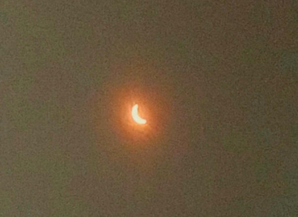 Covering a Smart phone with approved eclipse viewing glasses was an effective way to capture shots of the event as the moon began to cover the sun, creating the first total eclipse since 1979.