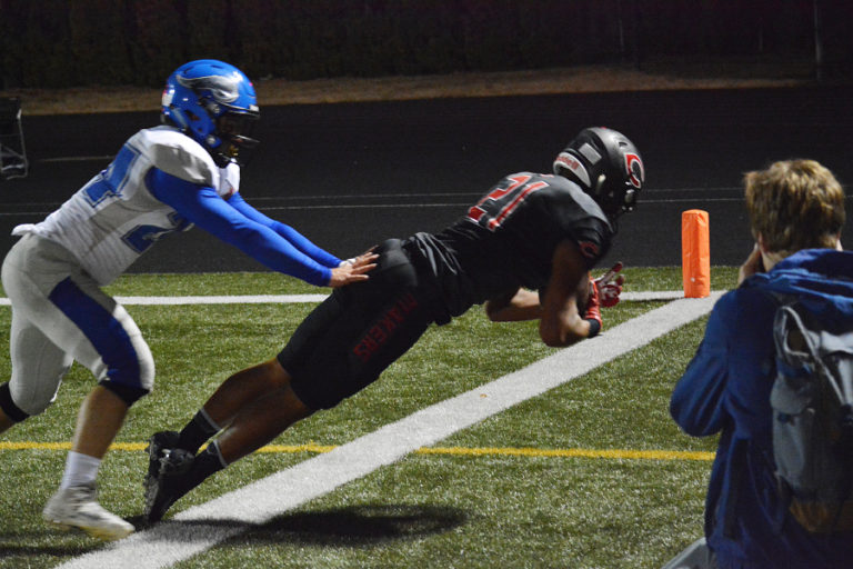 Drake Owen plants his feet in-bounds and secures a 13-yard touchdown pass.
