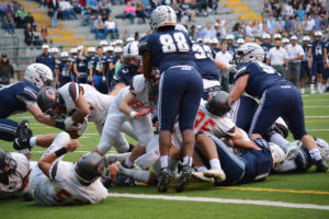 Semisi Schultz dives into the end zone for a Camas touchdown Friday, at Kiggins Bowl. The Papermakers defeated Skyview 38-20 to extend their in-season winning streak to 56 games.