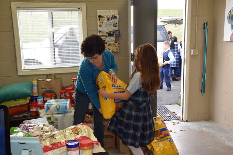 The students from Rachel Neuberger’s second grade class helped unload the schools donations into the dog shelter at the WCGHS.