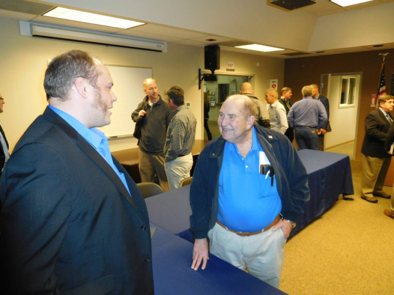 Port of Vancouver Commissioner Eric LaBrant (left) talks to Port of Camas-Washougal Commissioner Bill Ward, after a meeting of the ports of Vancouver, C-W and Ridgefield, Monday, at the Port of C-W office. The regional port leaders discussed legislative priorities for 2018.