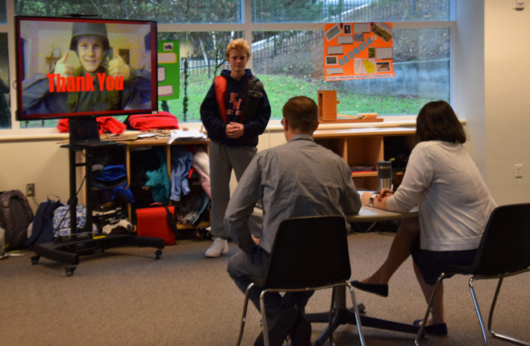 Rockwell Dueck, eighth grader at Odyssey Middle School, presents his passion project to teachers on Monday, Dec. 4. Dueck proposed to make a 45 minute to one hour long war film about World War II.