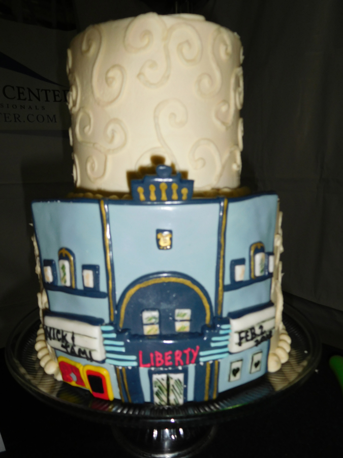 Cake Happy co-owner Nikki O'Keeffe created the wedding cake for Nick Calais and Tami Weidert, featuring an image of the Liberty Theatre, in downtown Camas. Calais and Weidert were married inside the theater Friday, Feb. 2. 