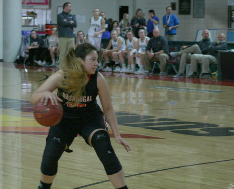 Panther Junior Tiana Barnett brings the ball up the floor in the Yakima Sundome on Feb.