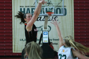 Panther leading scorer and rebounder Beyonce Bea pops a jumper during a state tournament game against the Lynden Lions on Feb. 28, at the Yakima Sundome.