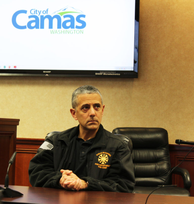 Camas-Washougal Fire Chief Nick Swinhart listens as firefighters and supporters tell Camas City Council members on Monday, March 19, that the city needs to find a way to have at least three, if not four, firefighters on each engine call if firefighters are going to safely fight fires and save lives.