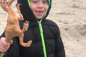(Contributed photo courtesy of the Reagan family)
Declan Reagan, son of Washougal Police Officer Francis Reagan, played this weekend with a velociraptor dinosaur toy, sent from people who work with “Jurassic World” and “Guardians of the Galaxy” actor Chris Pratt. Declan, 5, spent the weekend in Lincoln City, Oregon, with his twin brother, Adrian, their father, and mother, Lauren Reagan. Pratt recently sent an encouraging video to Declan and his family. Declan, 5, has been battling cancer off and on for two years. 
