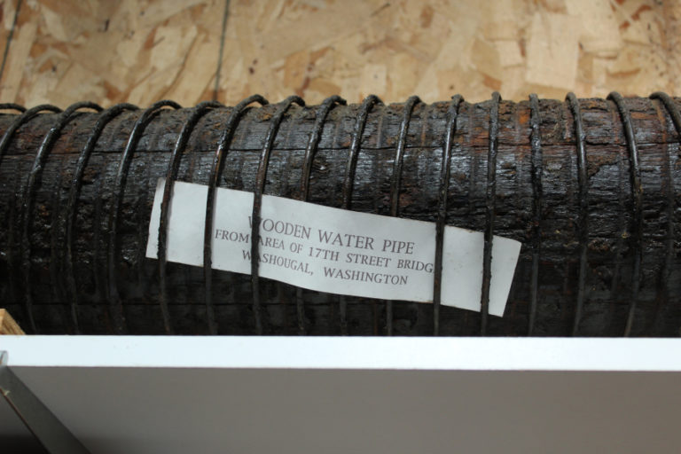 A wooden water pipe from the 17th Street Bridge in Washougal hangs in the outside &quot;tool shed&quot; at the Two Rivers Heritage Museum in Washougal.