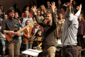 Kelly Pratt, composer, and Ethan Chessin, Camas High School choir teacher, conduct 200 Camas High students during rehearsal for the upcoming concert where students will collaborate with the rock band Bright Moments that will open at 6:30 p.m., Friday, April 13, at the Portland Institute for Contemporary Art (PICA), 15 N.E. Hancock St., Portland. (Contributed photos courtesy of Alicia J. Rose Photography)