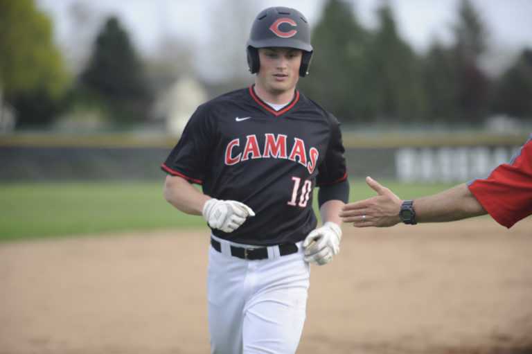 Luke Bruno rounds the bases during a game against Heritage High on April 9.