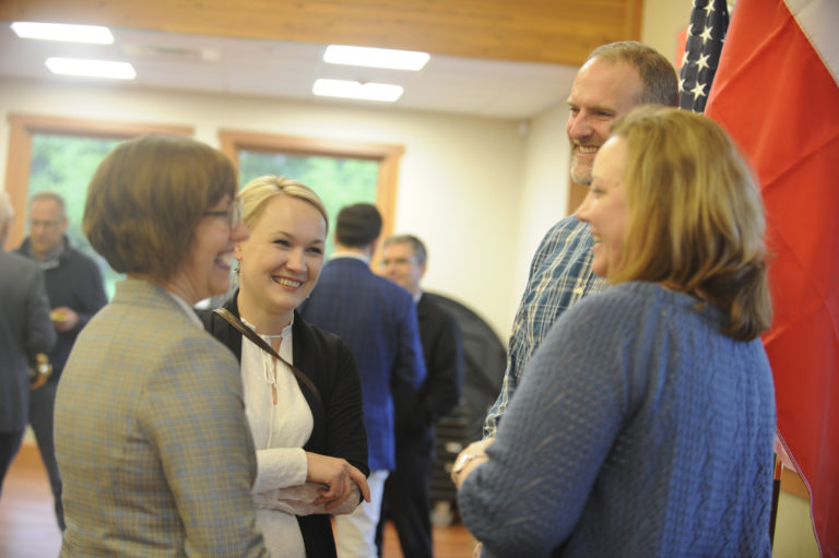 Monika Malicka, director of sport, culture and promotion in Morawica, Poland (center), visits with Camas Sister City Organization Treasurer Carolee Dewars, Camas City Councilwoman Shannon Turk and Todd Dewars (from left to right), April 27, at Lacamas Lake Lodge, in Camas.