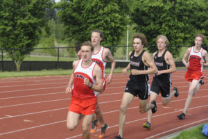 Papermakers distance runner David Connell leads the pack in the 1,600-meter race at Union High School on Friday, May 4. 