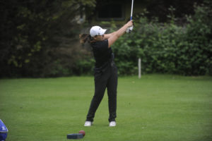Kallie Sakamoto tees off at Orchard Hills Country Club at the district tournament on May 15. 