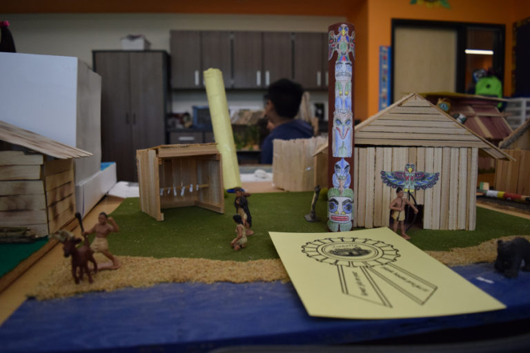 Third grade student Isabella Streuli said she enjoyed building  this plank house and creating the landscape.