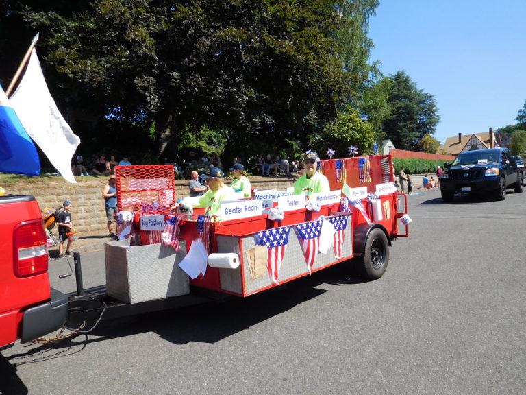 The Veterans of Foreign Wars Post 4278 entry in the Camas Days Grand Parade recognizes its members who have worked at the paper mill in Camas. The parade's theme, Saturday, July 28, was "Celebrating Papermaker History."