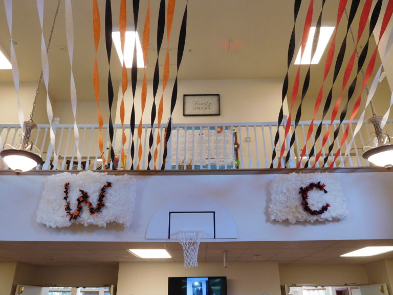 Columbia Ridge Senior Living staff members decorated the front lobby with the Washougal and Camas high schools' colors for the annual Senior Prom, Thursday, July 26, at Columbia Ridge, in Washougal.