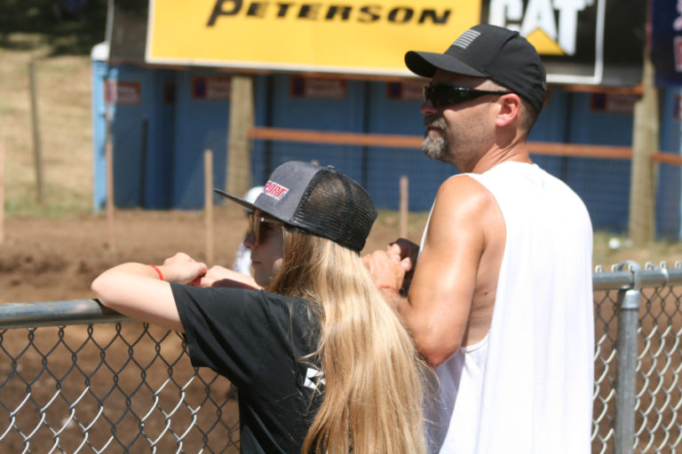 Motocross fans Caden Knudsen and her father Nick travel from their home in North Bend, Washington to the Washougal National every year.