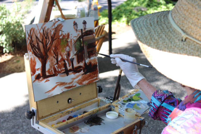 Artist Cheryl Mathieson paints a downtown Camas scene during the 2017 Plein Air art event. This year's event brings "en plein air" artists back to Camas' downtown streets on Friday, Sept. 7. The artists' work will be displayed at Camas Gallery that evening, during the September First Friday festivities, and auctioned off Saturday, Sept. 8, at the Dinner in White on the Columbia fundraiser.