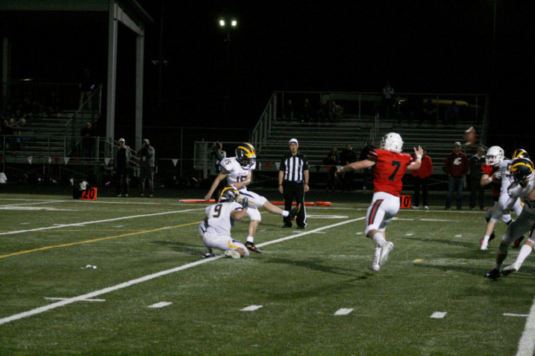 Bellevue kicker Jed Michael hits the game-winning kick against Camas, Sept.