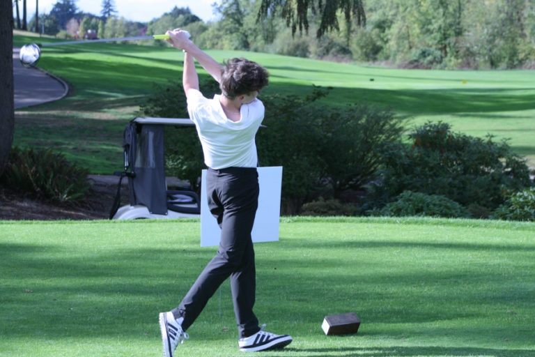 Camas golfer Caleb Shira swings at a Sept.
