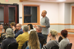 Ed Fischer (standing), owner of Camas Bike and Sport, comments at a meeting about downtown Camas events and road closures, held Sept. 19, at Lacamas Lake Lodge. Fischer helped coordinate the meeting, and said he believes frequent street closures have negative impacts on some businesses.