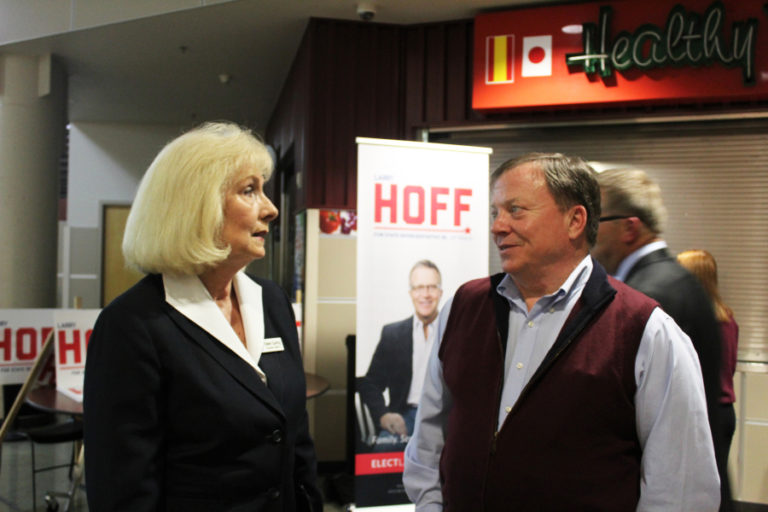 Eileen Quiring, Republican candidate for Clark County Council Chair, (left) talks to Camas City Councilman Steve Hogan.